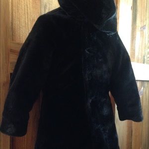 Girls reversible fake fur and satin jacket.